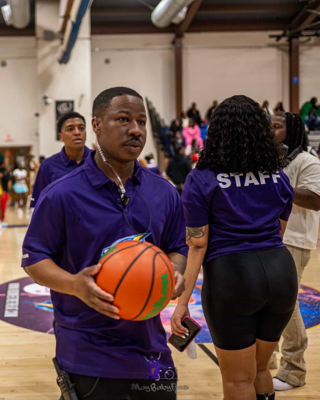 CJ Burnett working a Trenton celebrity basketball game.